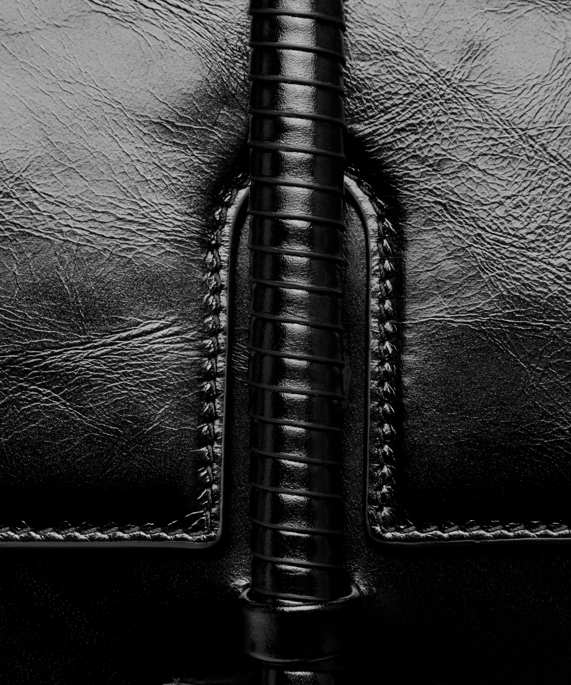 KUN HONG the CHUA collection Handbags Mother Satchel Daughter Mini  Close-up of a black leather wrapped handle detail and stitching details