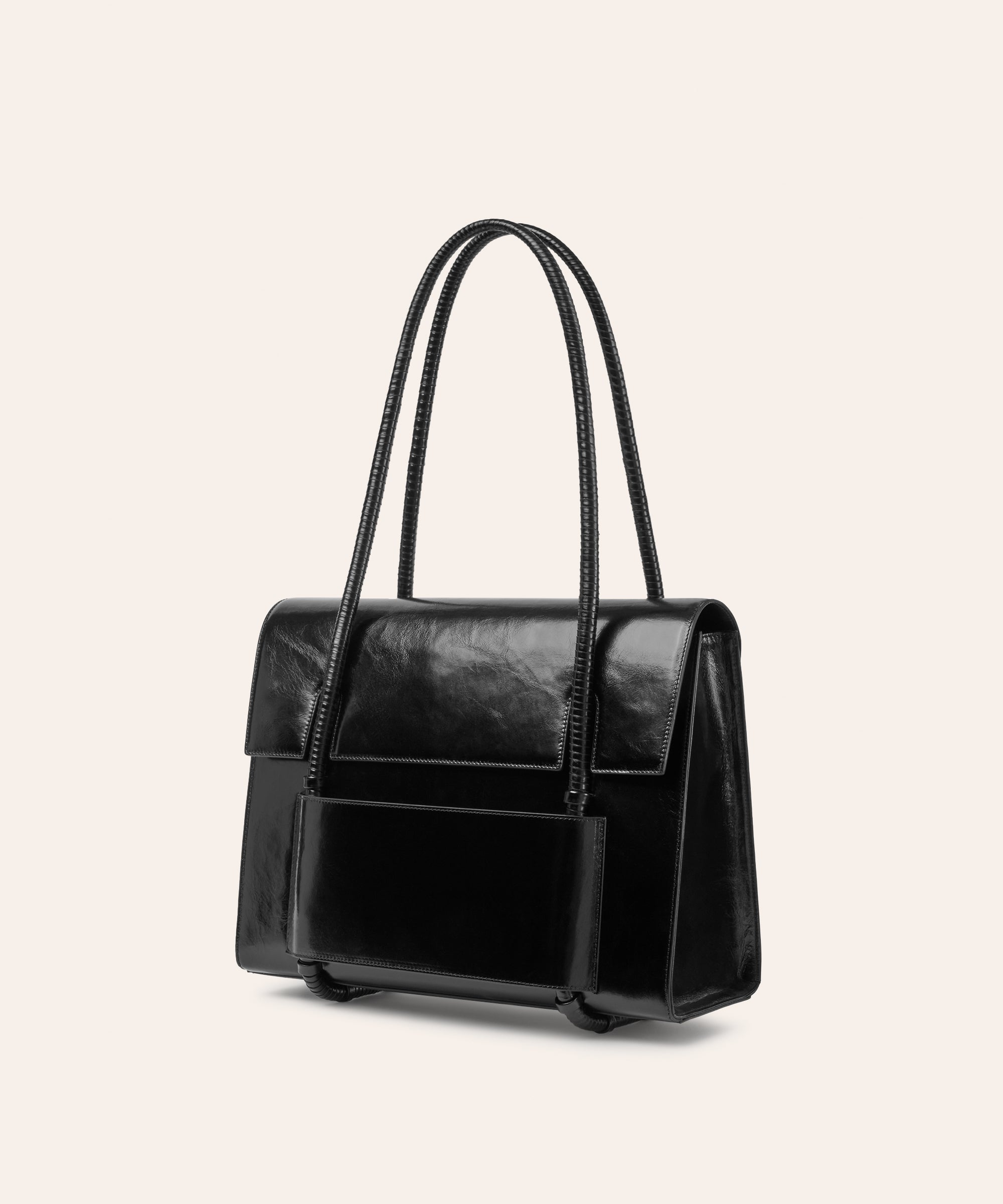 KUN HONG the CHUA collection Handbags Mother Satchel Daughter Mini Black Lacquer Black handbag with a glossy finish on a beige background